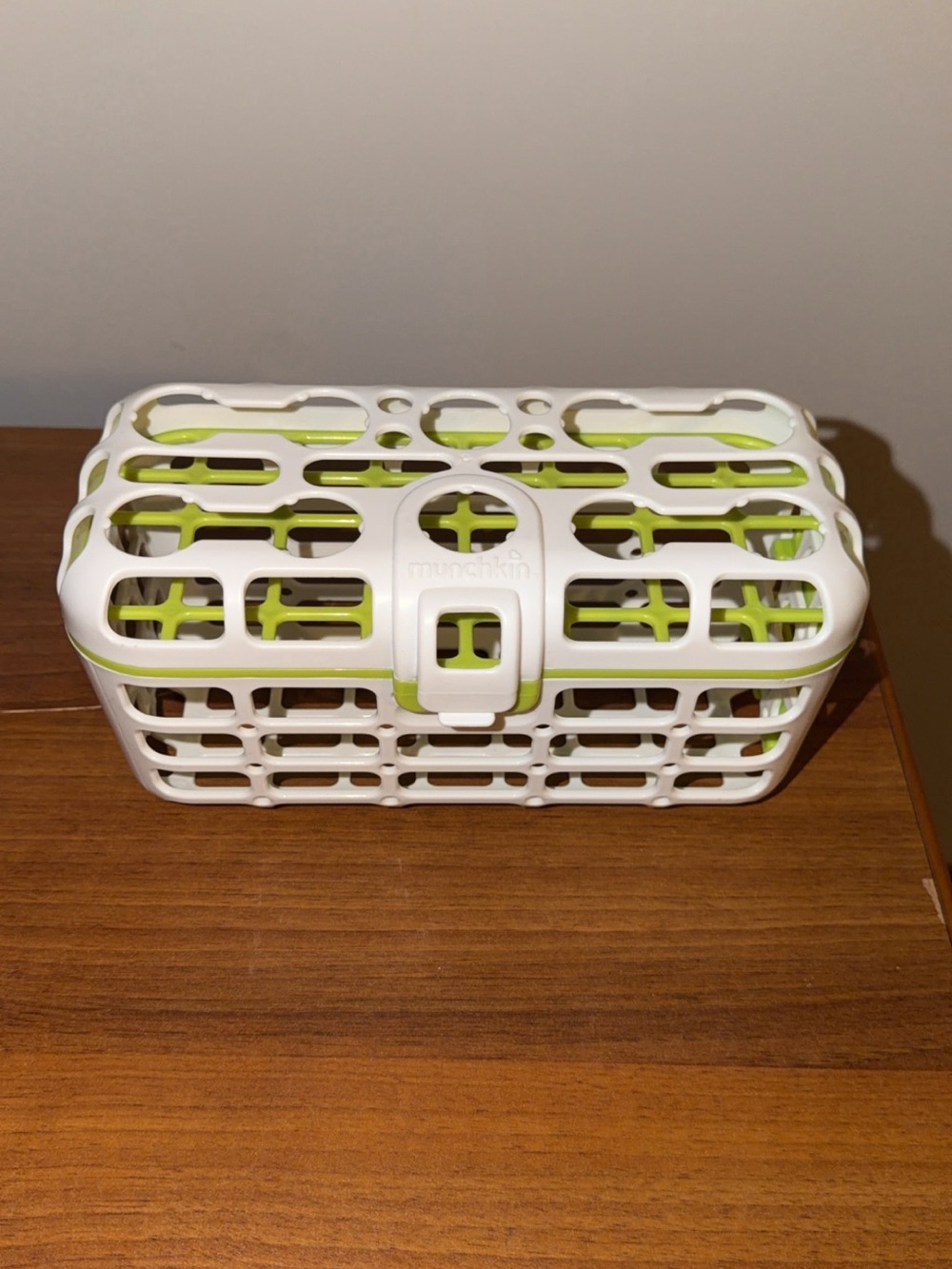 Munchkin green and white dishwasher basket for bottle nipples/pacifiers